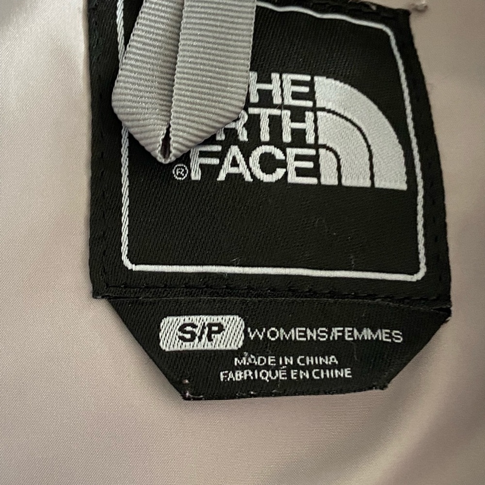 I am selling a blue north face vest